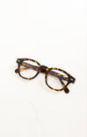 Tortoiseshell eyeglasses on a white background