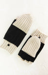 Knitted hat and gloves set with black accents on a white background