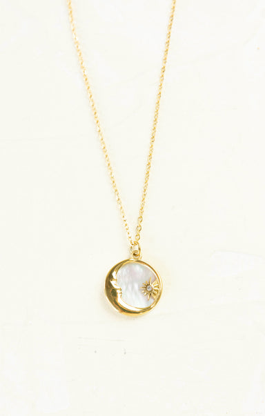 Gold chain with sun and moon pendant