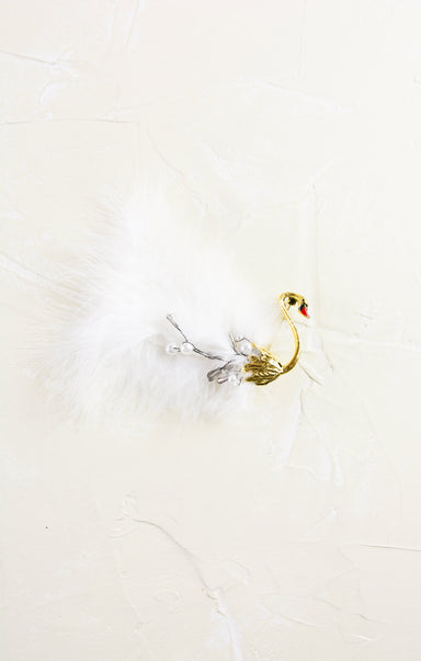 Decorative swan ornament on a white background