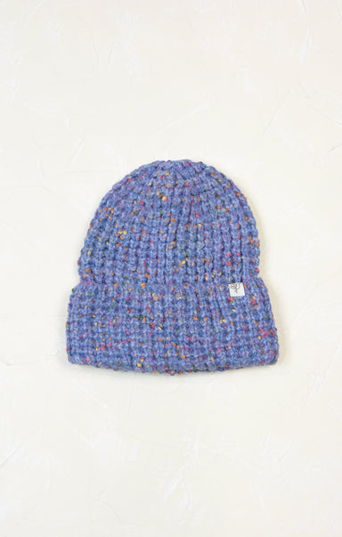 Blue knitted beanie on a white background
