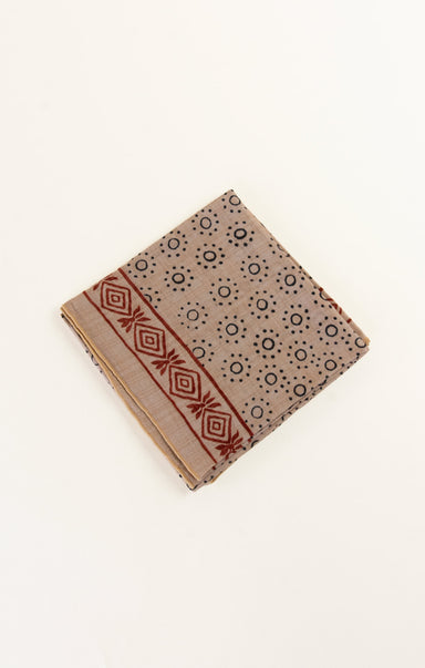 Beige fabric with geometric pattern on a white background