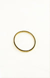 Gold hoop earring on a white background