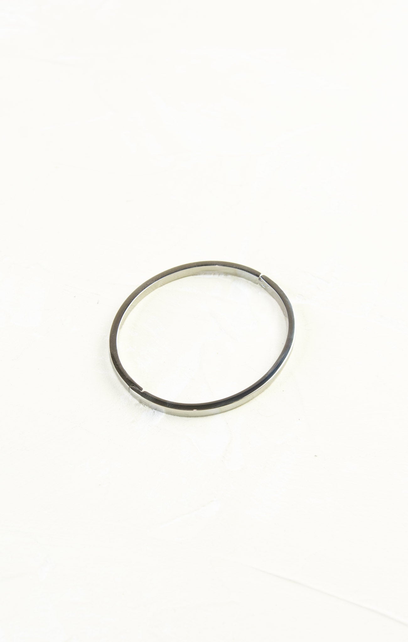 Silver ring on a white background