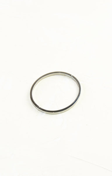 Silver ring on a white background