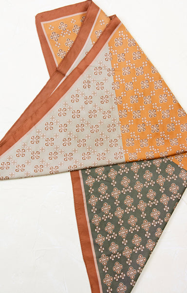 Three patterned fabric swatches on a white background