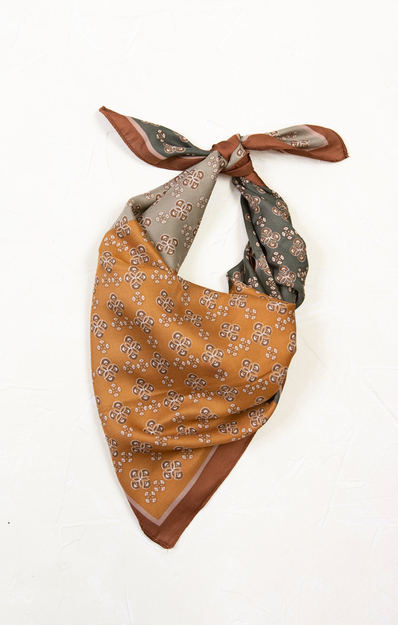 Neckerchief with brown and gray pattern on a white background