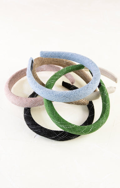 Set of colorful headbands on a white background