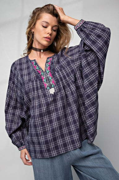 VALERIE EMBROIDERED PLAID TOP - Navy plaid top with oversized fit, detail going down the neckline, long sleeve