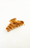 Tortoiseshell hair comb on a white background