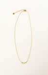 gold necklace on a white background
