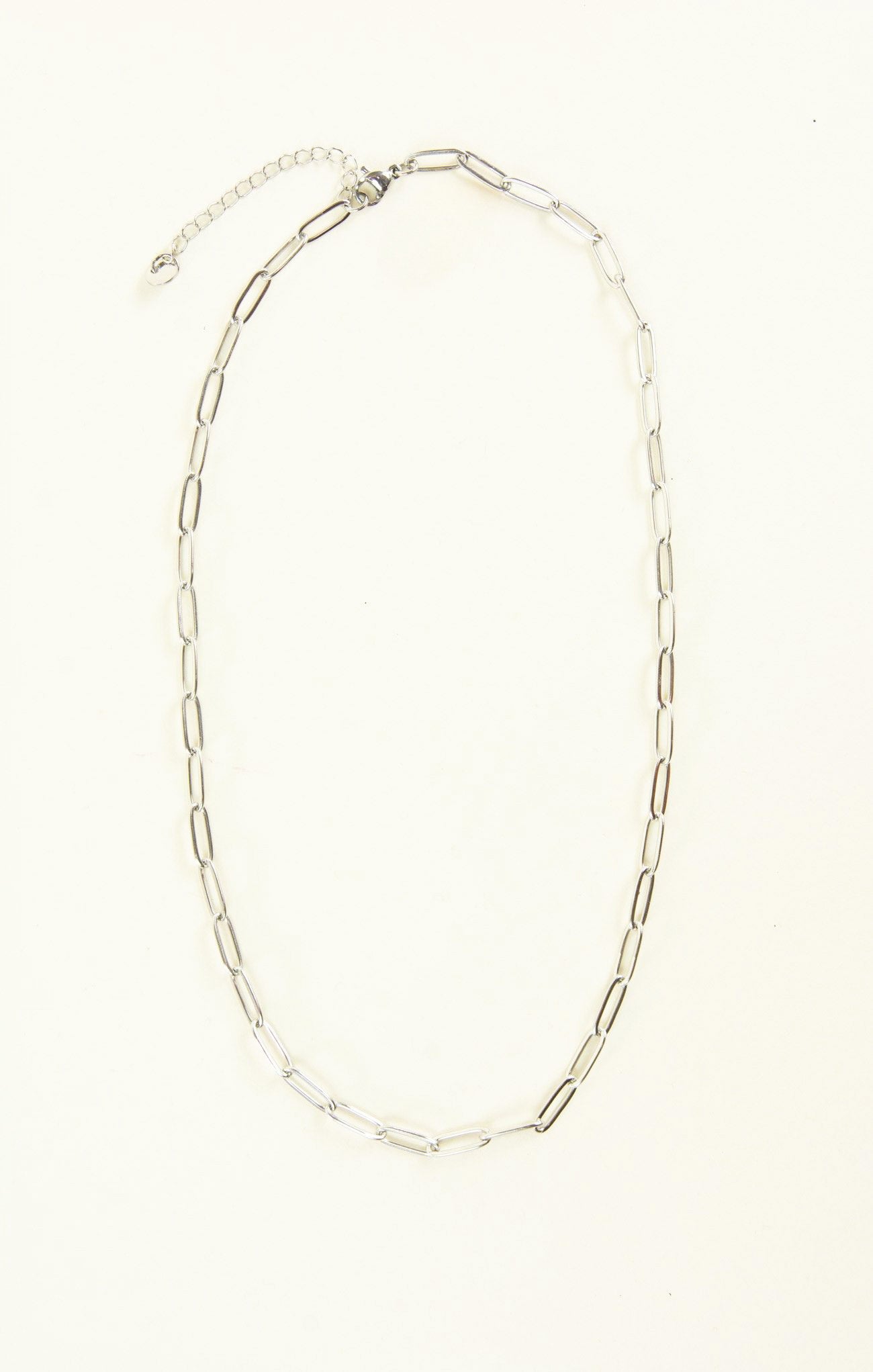 Silver chain necklace on a white background