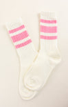 White socks with pink stripes on a light beige background