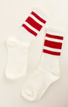 White socks with red stripes on a light gray background