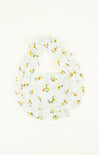White scarf with yellow floral pattern on a white background