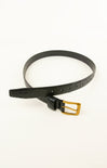 Black belt with a gold buckle on a white background