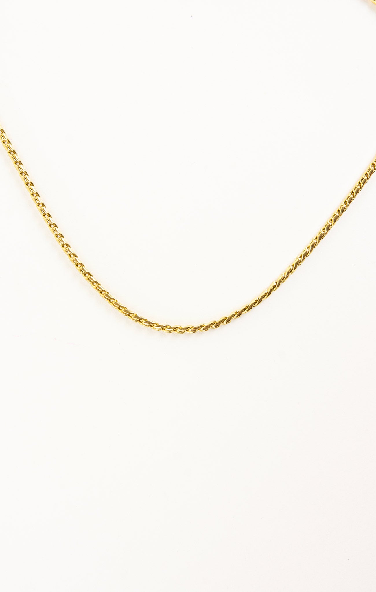 Gold chain on a white background