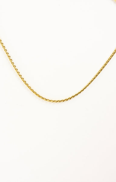 Gold chain on a white background