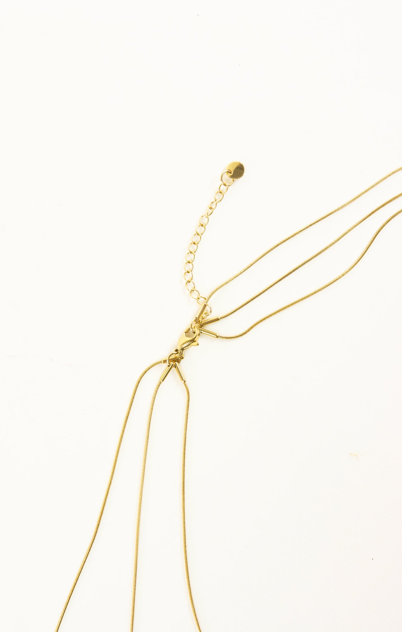 Gold necklace on a white background