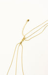 Gold necklace on a white background
