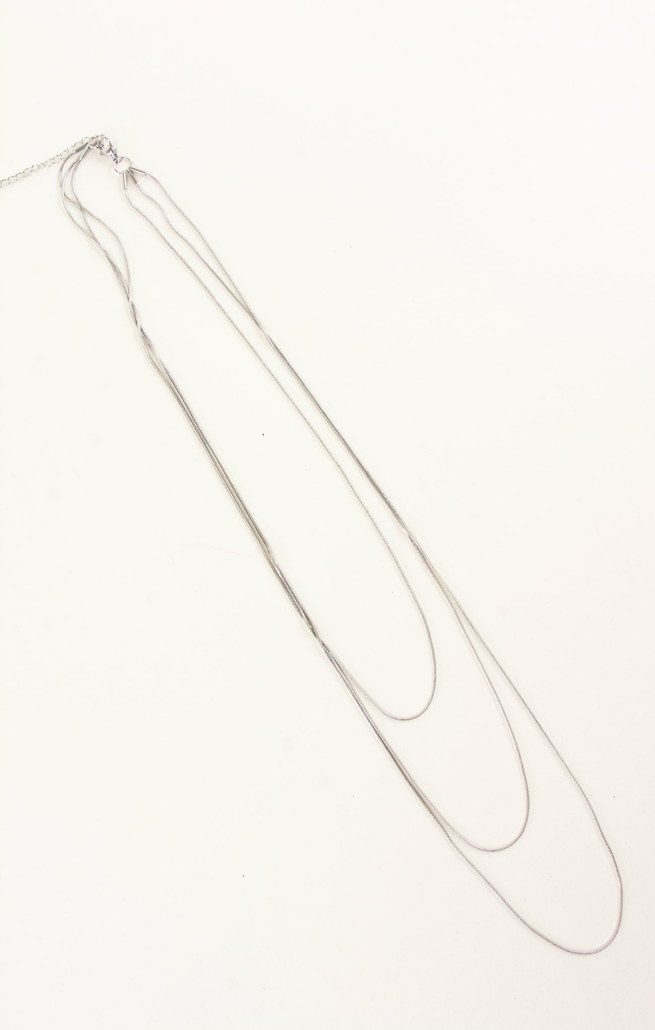 silver necklace with three layers