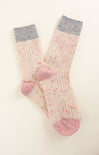 Pair of pink socks with gray cuffs on a white background