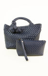 Blue woven handbag and matching pouch on a white background