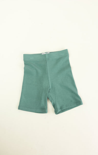 Green shorts on a white background