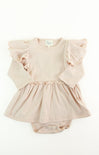 Beige baby dress with ruffled sleeves on a white background