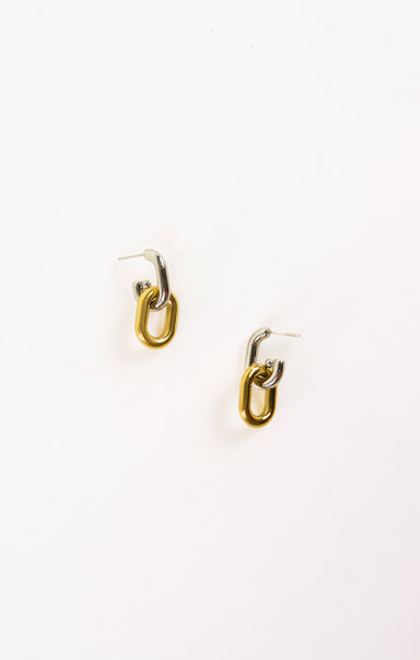 Gold hoop earrings on a white background