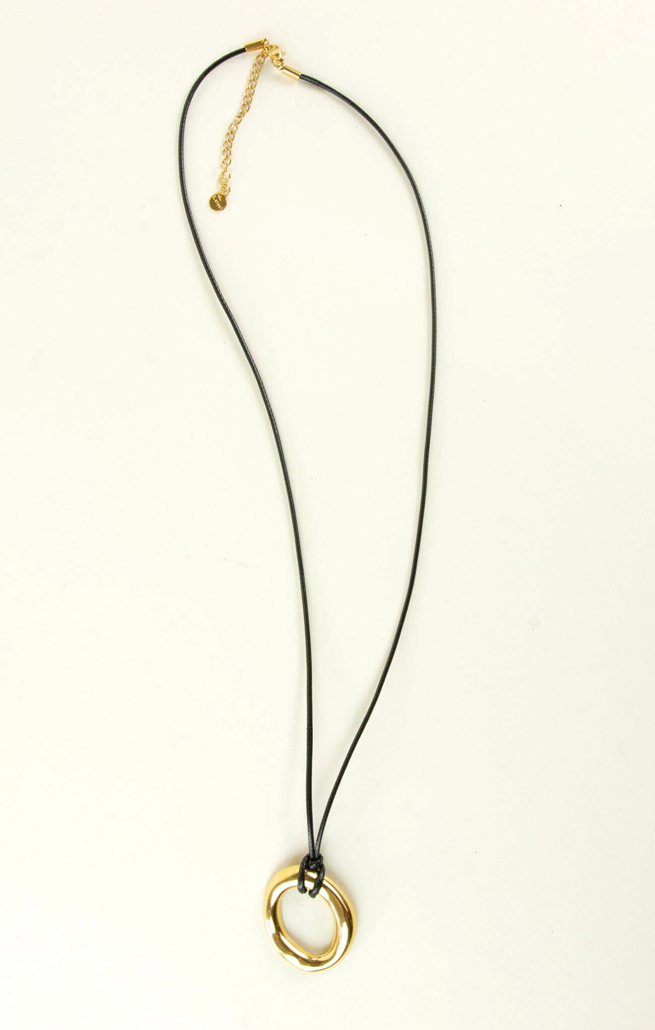 Necklace with a gold ring pendant on a white background