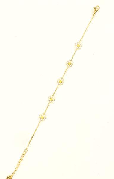 Gold anklet with floral designs on a white background