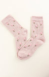 Pink socks with floral patterns on a white background
